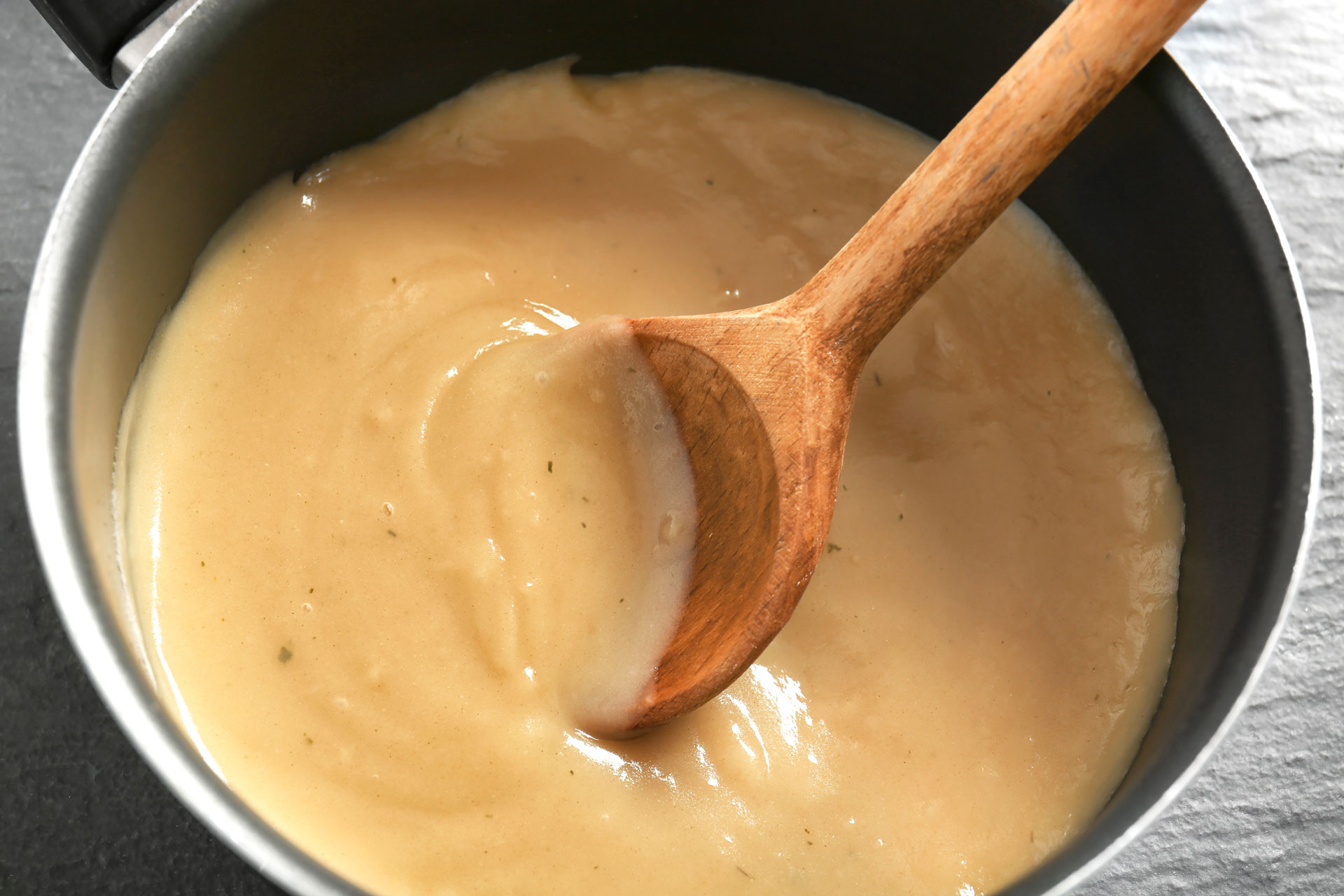 Turkey gravy in saucepan