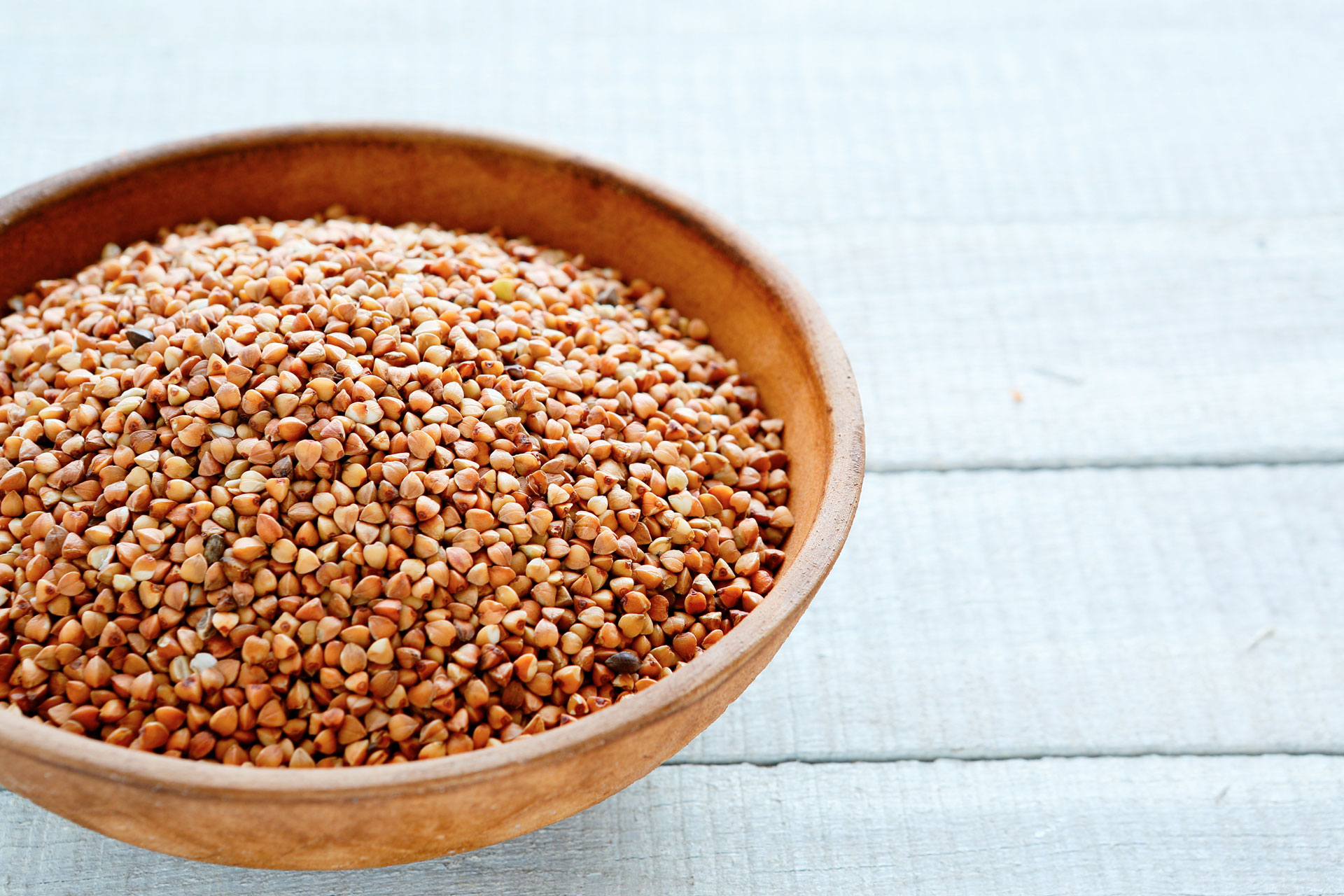 Brown buckwheat in a round bowl