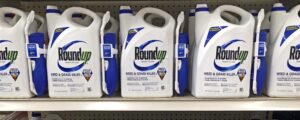 bottles of roundup pesticide on store shelves