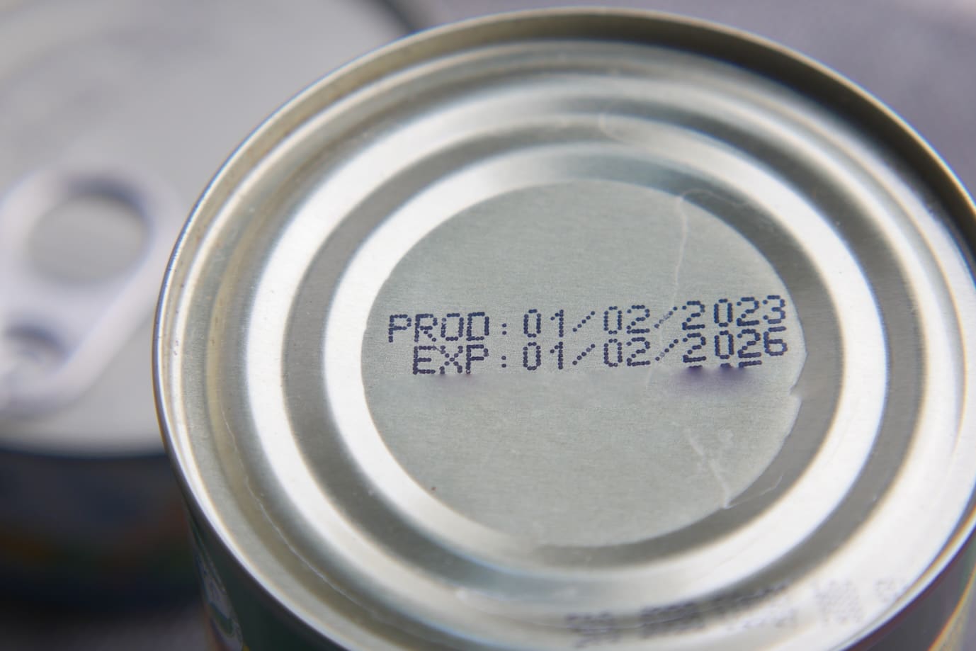 expire date on food can on white background